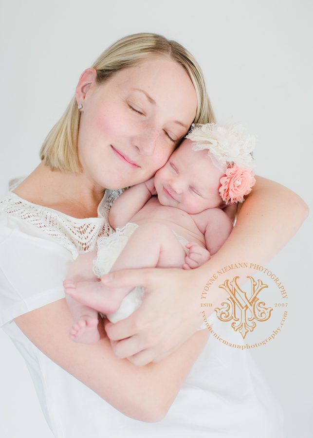 Sweet and pure portrait of mother and infant girl taken by Bishop, GA newborn photographer, Yvonne Niemann Photography.