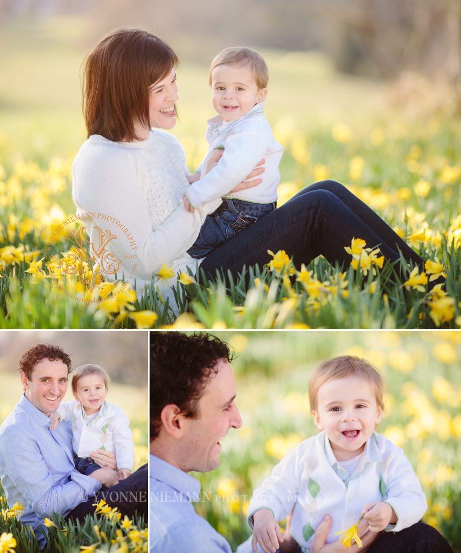 Happy family photos in a field of yellow daffodils in Watkinsville, GA taken by Yvonne Niemann Photography.