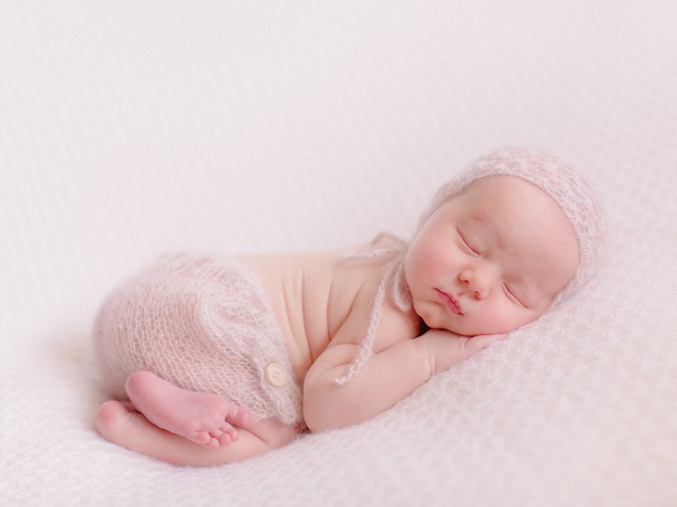 Tuscaloosa newborn photography of two week old infant boy.