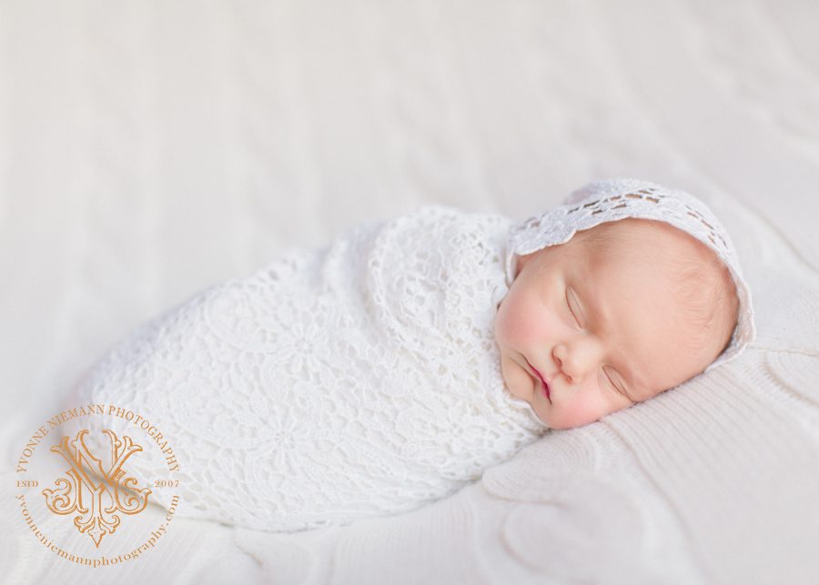 Timeless newborn photography by best Athens baby photographer.