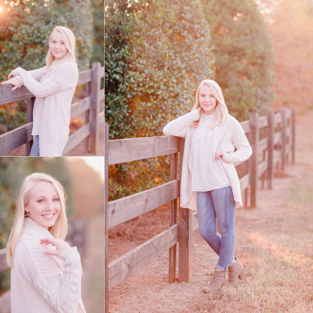 Oconee County High School senior pictures of a girl by a wooden fence.