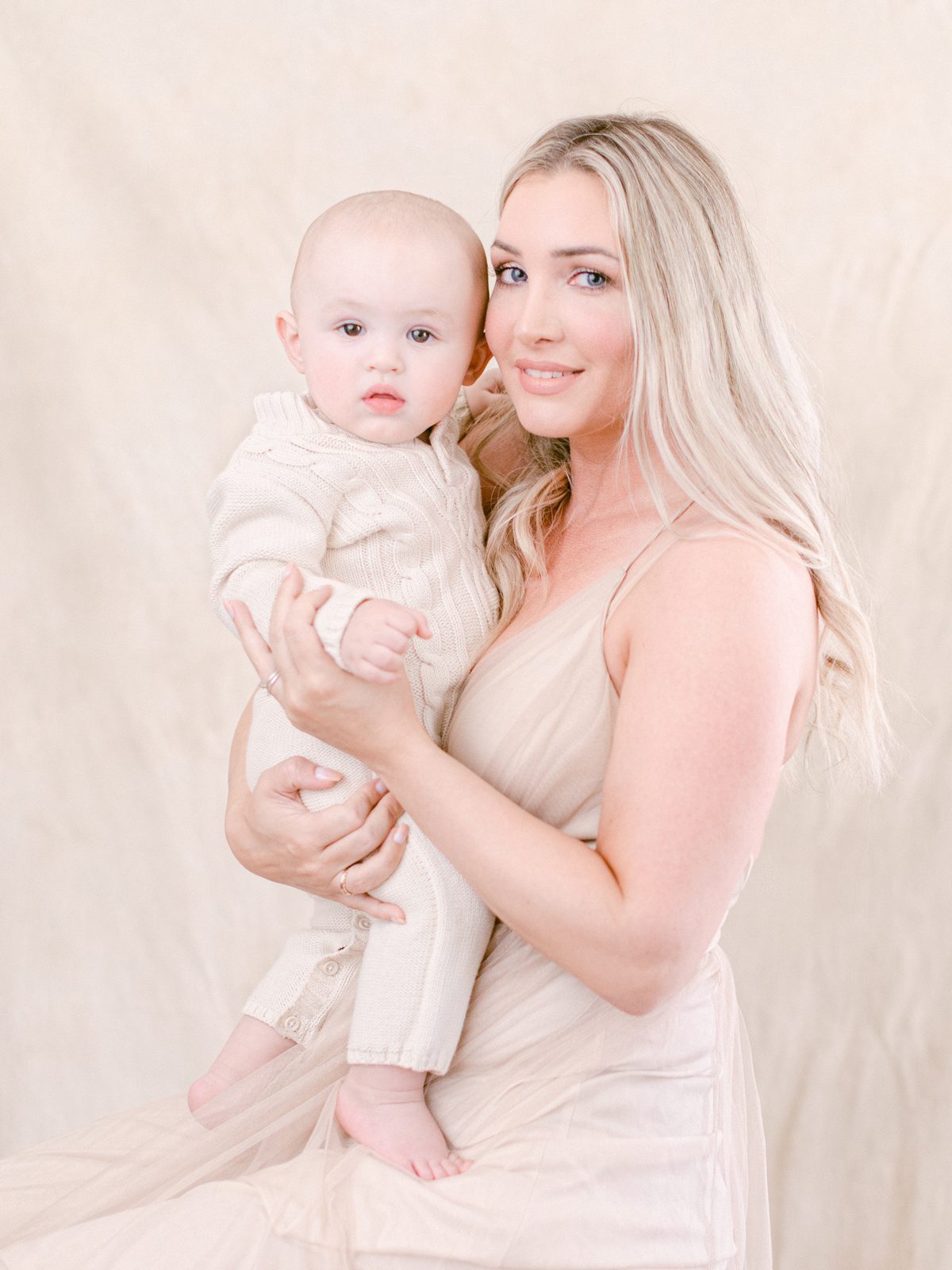 studio portrait photography of an eight month old baby boy with his mom taken in Oconee County, GA.