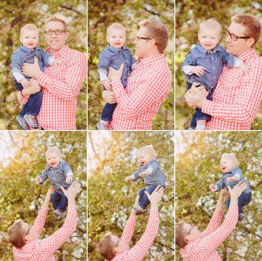 Fun father son photos of one year old with dad in the Spring by flowering trees in Bishop, GA.