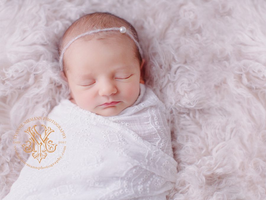 Natural photography of an infant girl in a peaceful slumber at her home in Watkinsville, GA.