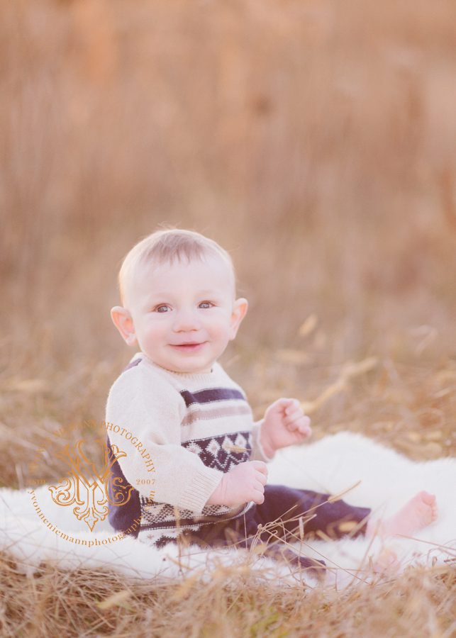 Winter Watkinsville baby photography in a field taken by Yvonne Niemann Photography.