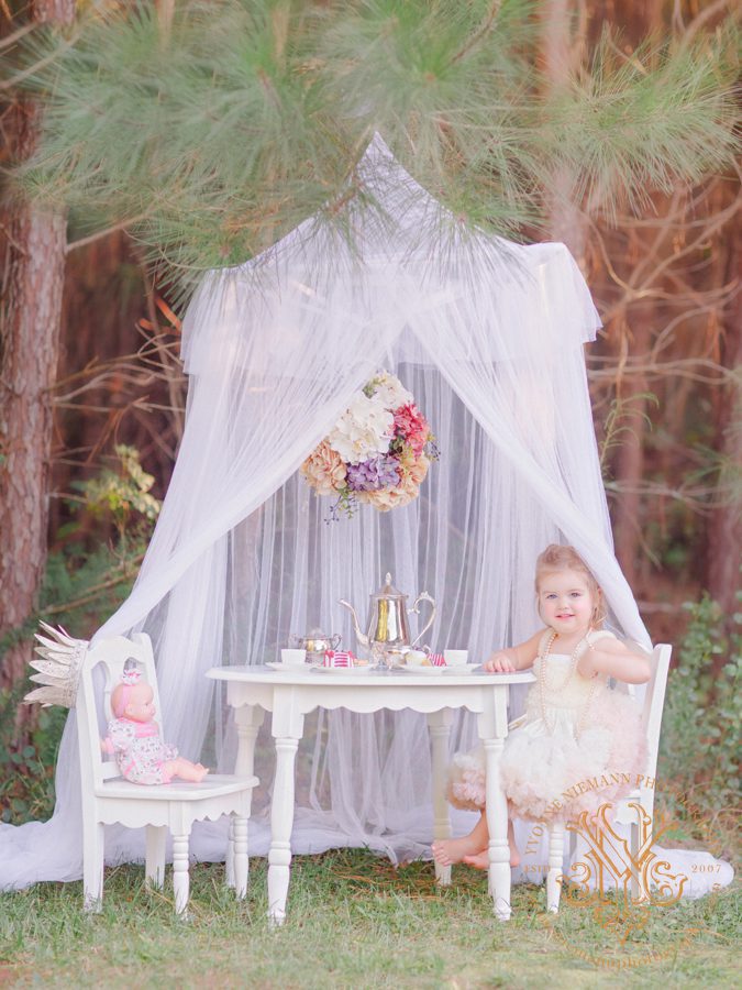 Photography of a little girl tea party in the woods in Oconee County, GA.