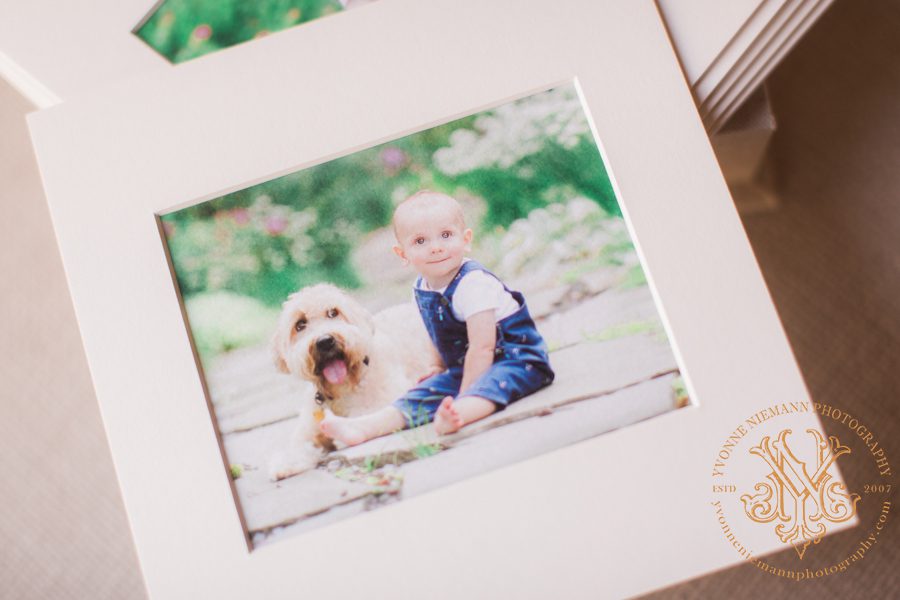 image of baby boy with his dog printed on watercolor fine art paper and matted