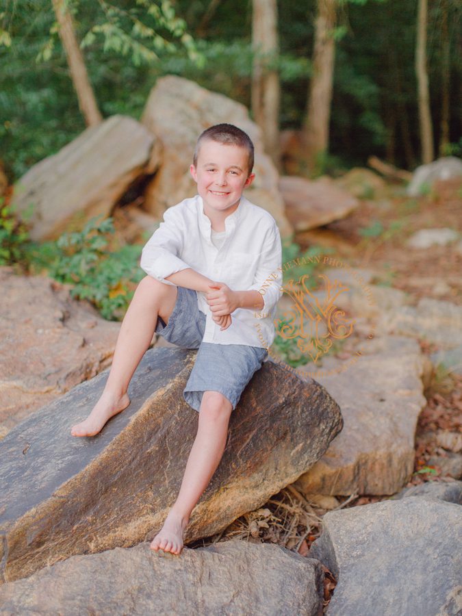 Natural portrait photography of a tween boy in the woods of Georgia near Athens, GA.