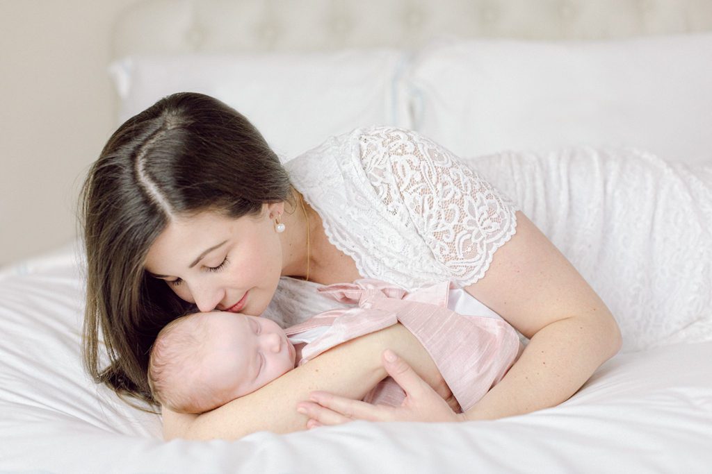 Oconee County, GA in home newborn photography of Mother and infant girl.