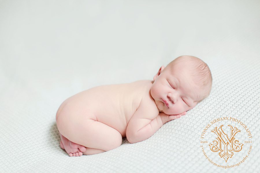 Adorable newborn portrait of infant boy taken at family home in Kirkwood, MO by Yvonne Niemann Photography
