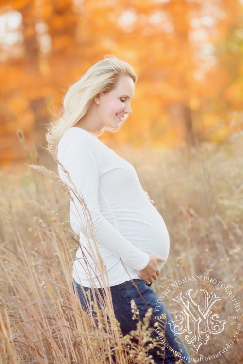 Beautiful fall maternity photography taken by Yvonne Niemann Photography in St. Louis.