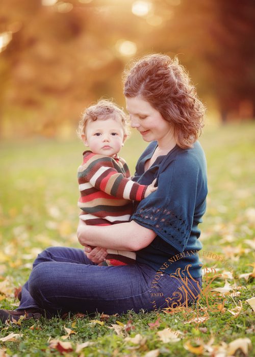 Beautifully Fall Light Surrounding Mother and Child captured by St. Louis Child Photographer, Yvonne Niemann.