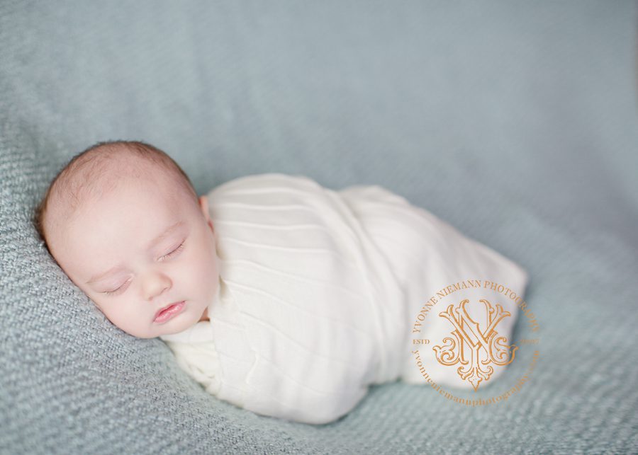 Portrait of a six week infant boy taken at family home in St. Louis by Yvonne Niemann Photography.