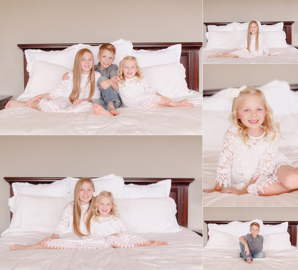 At home sibling photos on parents bed in Oconee County, GA.